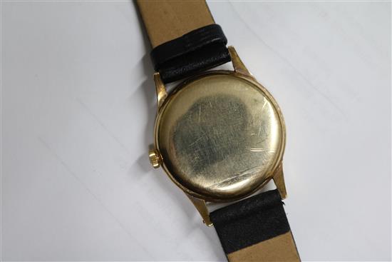 A gentlemans 1940s 14ct gold Omega manual wind wrist watch.